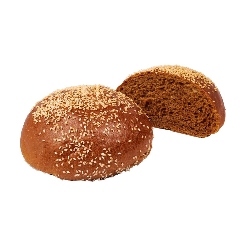 Ganzer Mischbrot-Bun vor einer aufgeschnittenen Hälfte mit dunkler Krume